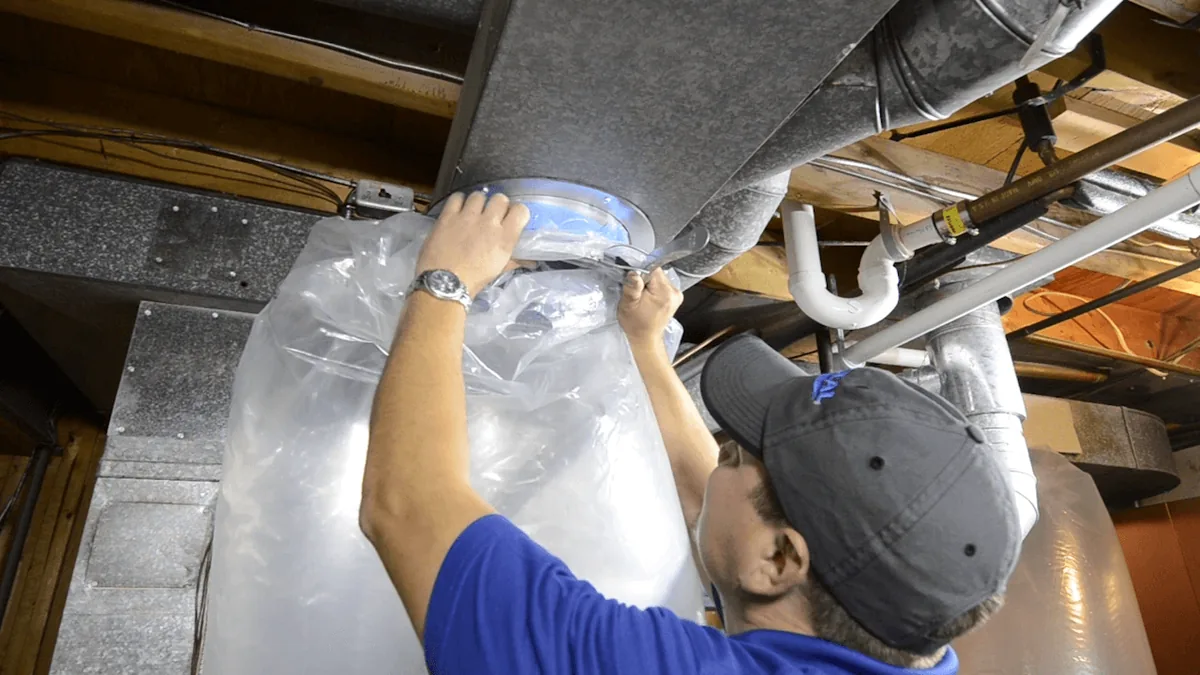 a man sealing a duct