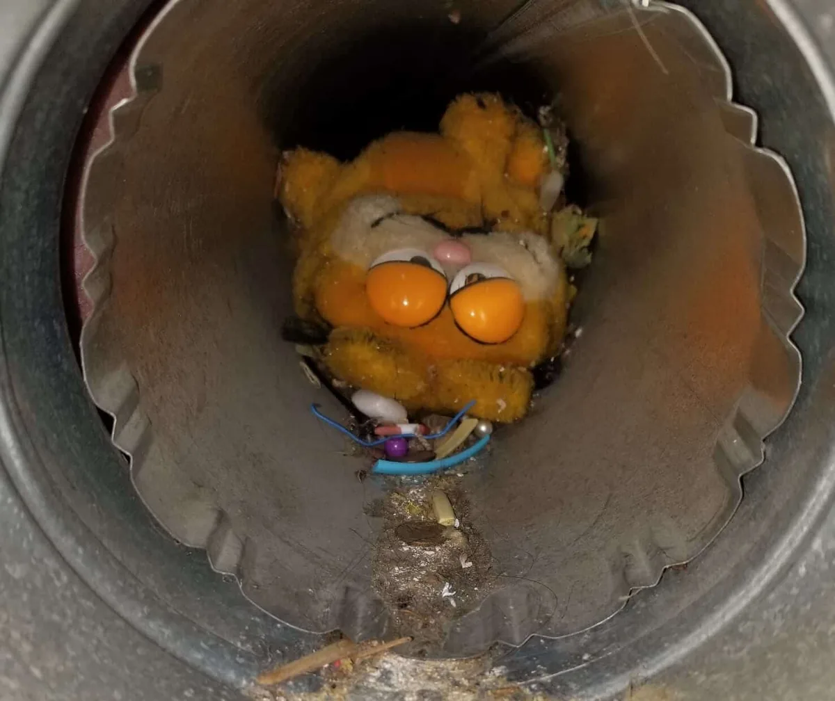 Stuffed animal removed from home air duct system