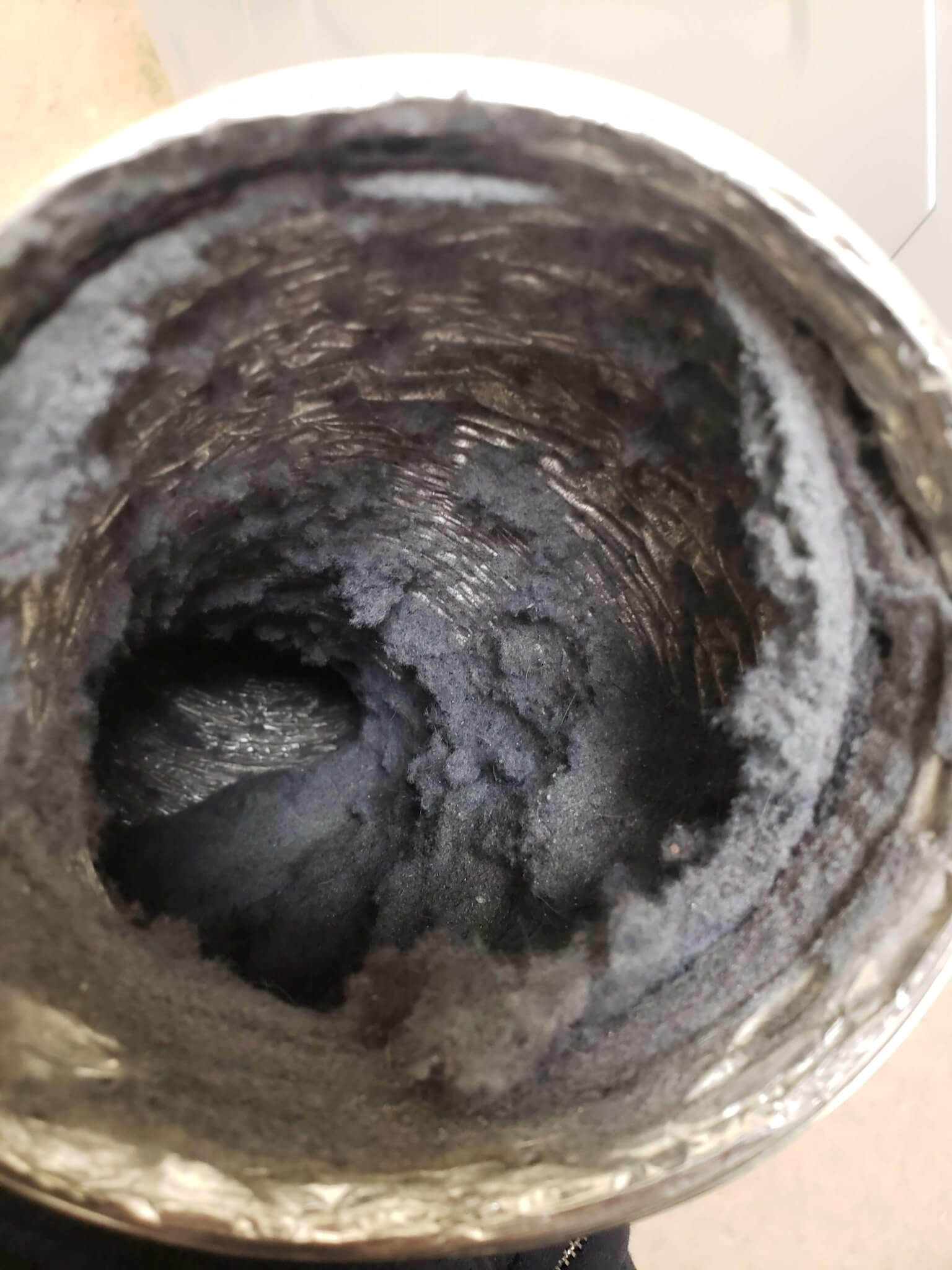 dryer-vent-cleaning-before-and-after-planet-duct